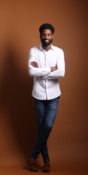 istock Beautiful black man in front of a brown background 1078455462