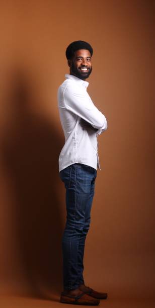 istock Beautiful black man in front of a brown background 1078455616