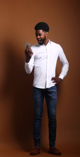 istock Beautiful black man in front of a brown background 1078455638