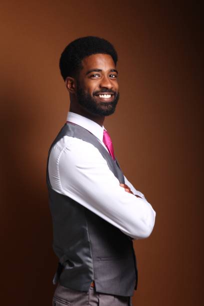 istock Beautiful black man in front of a brown background 1078455680