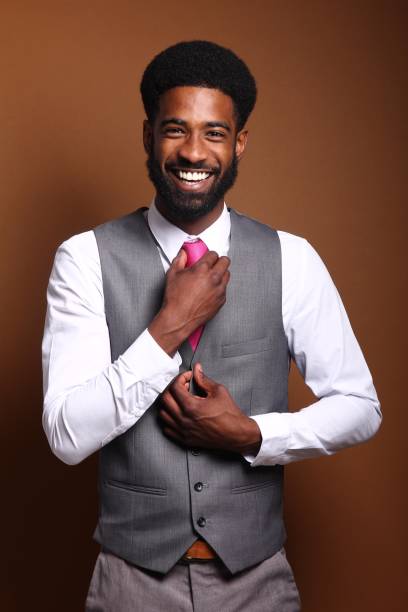 istock Beautiful black man in front of a brown background 1078455688