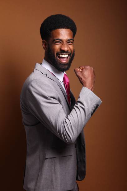 istock Beautiful black man in front of a brown background 1078455722