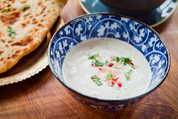 istock Indian Raita -  fresh yoghurt based sauce dip with mint coriander and other herbs. 1078455888