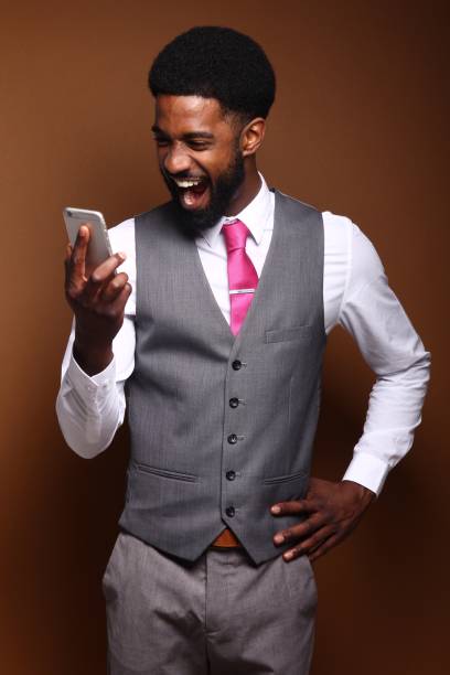 istock Beautiful black man in front of a brown background 1078456416