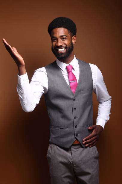 istock Beautiful black man in front of a brown background 1078456418