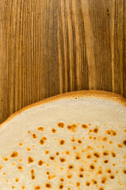 istock Pancake on Wooden Background 1078457910