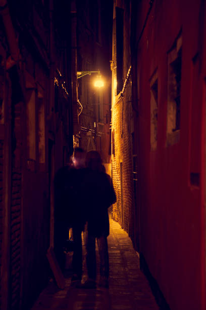 istock People shade alley night 1078472970