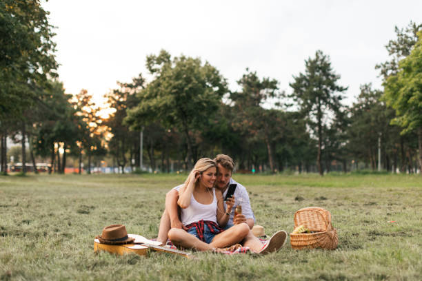 istock Listening music in the park 1078478356