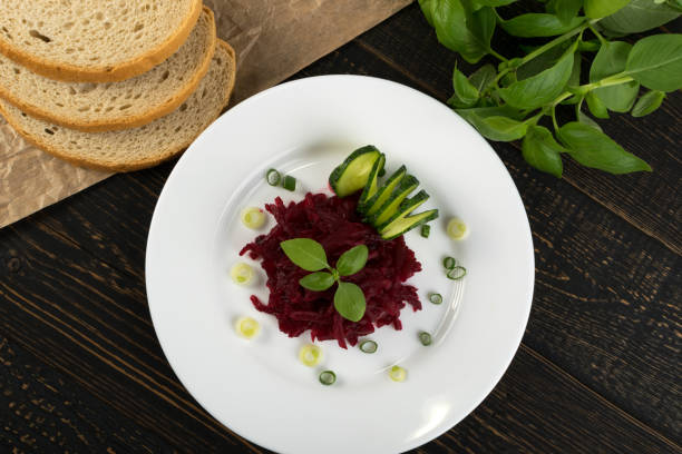 istock Grated Pickled Beet Root Isolated on Wood Rustic Background 1078480844
