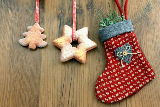 istock red Christmas sock with star shape cookies. 1078482752