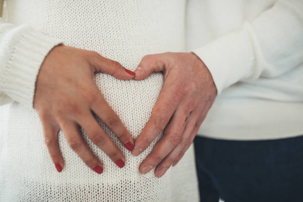 istock Couple touching her belly 1078483004