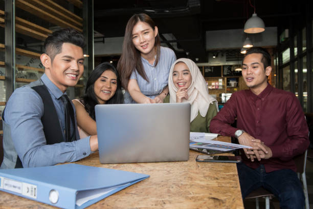 istock Young people conducting meeting in cafe and office 1078484942