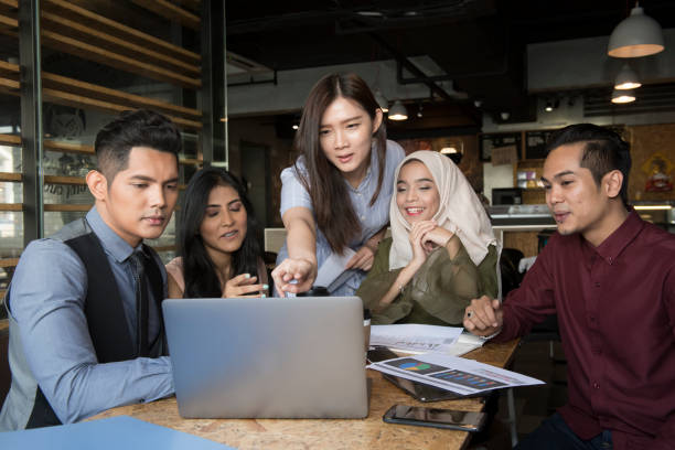 istock Young people conducting meeting in cafe and office 1078485244