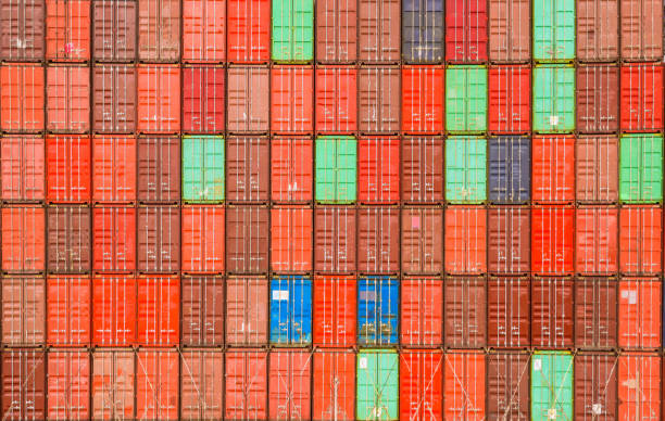 istock Container ship in export and import business and logistics. Shipping cargo to harbor by crane. Water transport International. Aerial view and top view. 1078487562