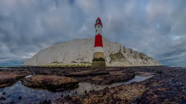 Looking up to Beachy Head light and cliff - a stitched panorama taken from below the light house at Beachy Head, East Sussex, UK