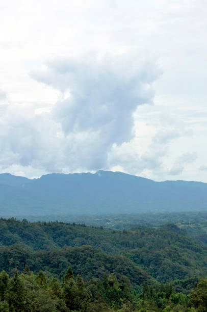 istock Gray clouds over mountain forest in autumn. 1078499404