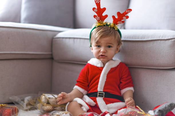 istock Happy nice boy celebrating New Year at home 1078501128