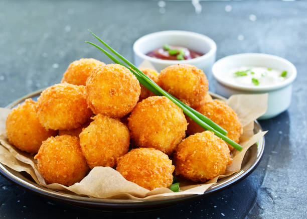 istock cheese balls with tomato sauce. 1078501574