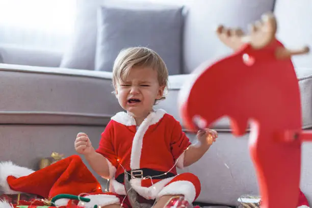 Photo of Crying santa baby boy