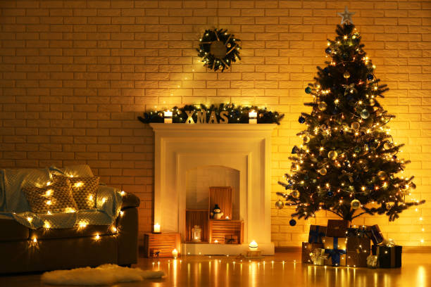 istock White decorated fireplace near christmas tree and sofa on brick wall background 1078505158