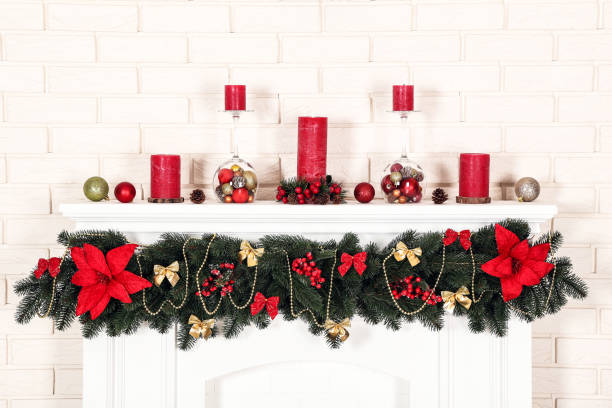 istock Christmas decorations with fireplace on brick wall background 1078505730