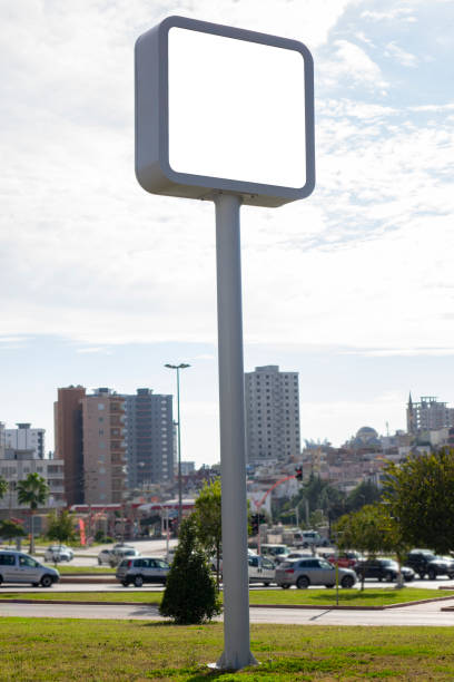 istock Billboard - Square Blank Billboard with empty screen and beautiful cloudy sky for outdoor advertising poster, Copy space banner ready for your advertisement design or mock up text. 1078507562