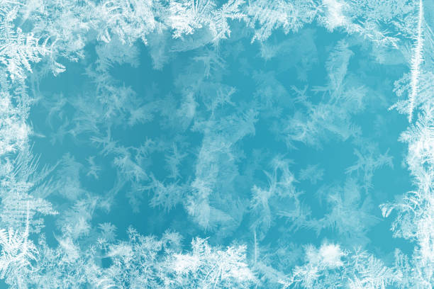 istock Frost patterns on frozen window as a symbol of Christmas wonder. Christmas or New year background 1078513168