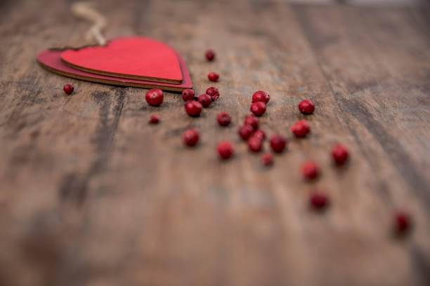 istock Heart on wooden backgroung 1078513380