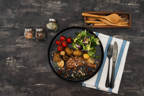 istock Roasted Chicken Legs BBQ With Spices, Tomato and pepper 1078515736