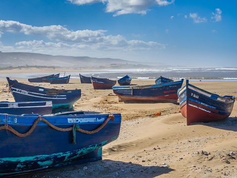 Fishing boats on Bhaibah beach near Essaouira, Morocco