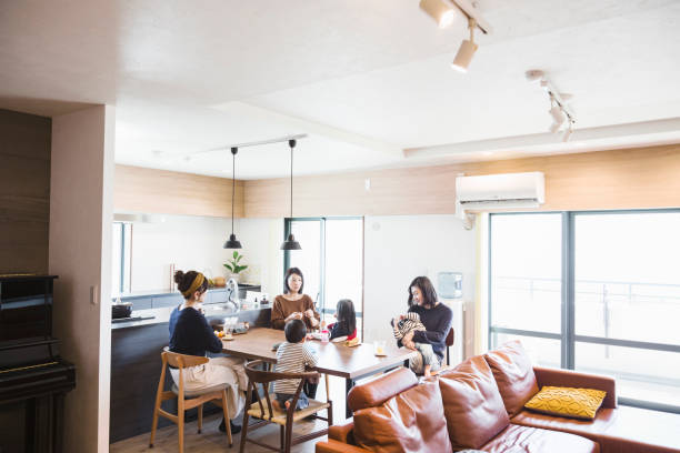 istock Mothers and kids having a snack on dining table 1078520854