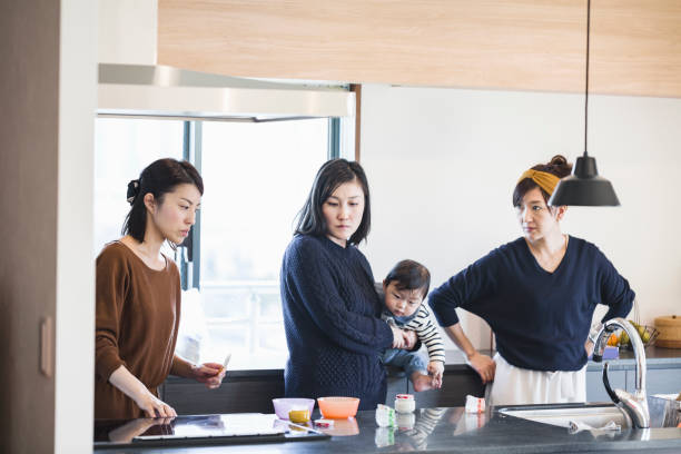 istock Women talking in the kitchen 1078521036