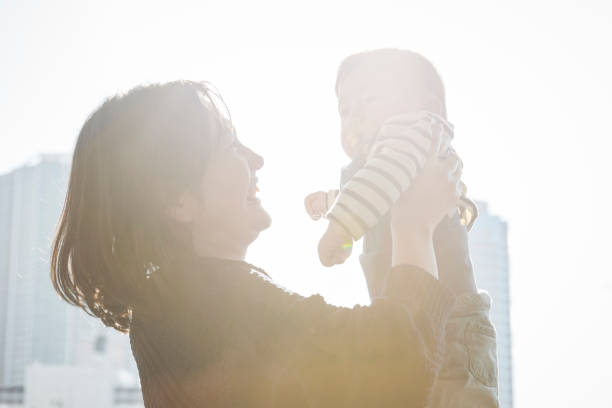 istock Mother and baby relaxed in the balcony 1078521192