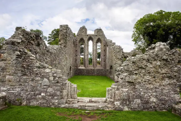 Ruins of Inch Abbey in Northern Ireland, United Kingdom. This ruined monastery is located near Downpatrick, County Down.