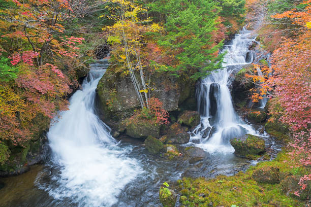istock Ryuzu waterfall in autumn, Nikko, Japan 1078536116