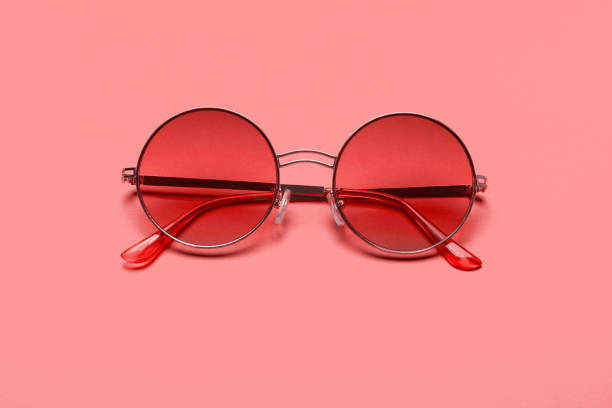 istock Beautiful trendly sunglasses on a pink background 1078536392