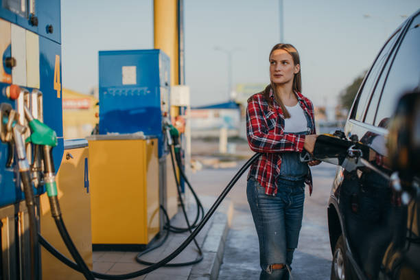 istock Woman pouring fuel 1078539990