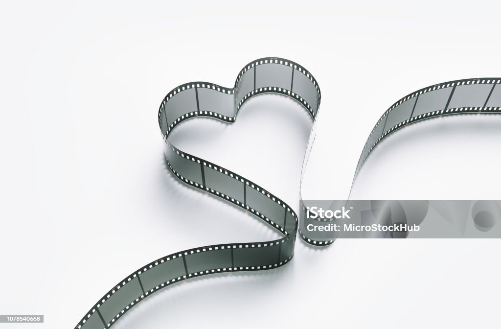 Heart Shaped Film Roll On White Background Stock Photo - Download