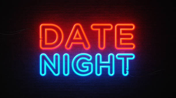 istock Date Night Neon Light On Black Wall - Dating And Flirting Concept 1078541132