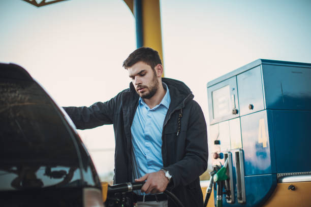 istock Man refueling gas tank 1078541152