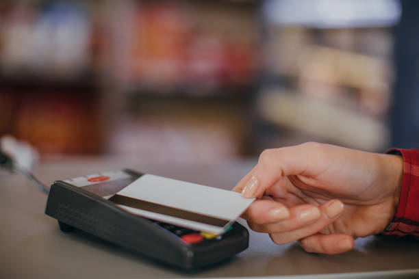 istock Woman paying with credit card 1078543548