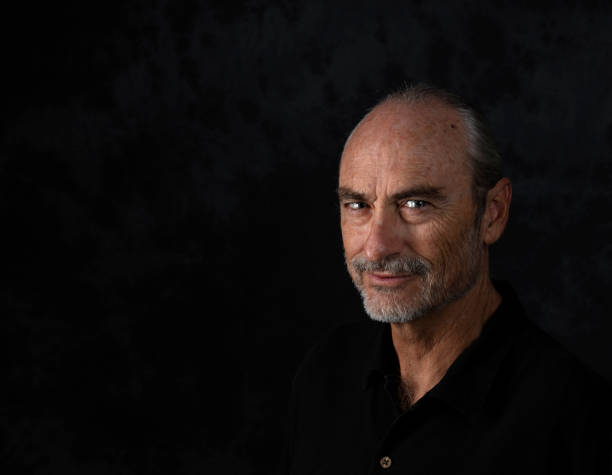 istock portrait of mature man smiling 1078546474