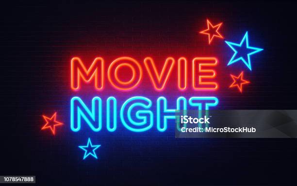 Movie Night Neon Light On Black Wall Movie Night Concept - Fotografie stock e altre immagini di Film