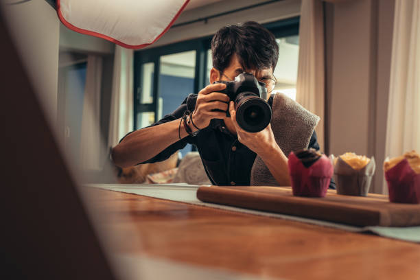 istock Food photographer shooting in his studio 1078551964