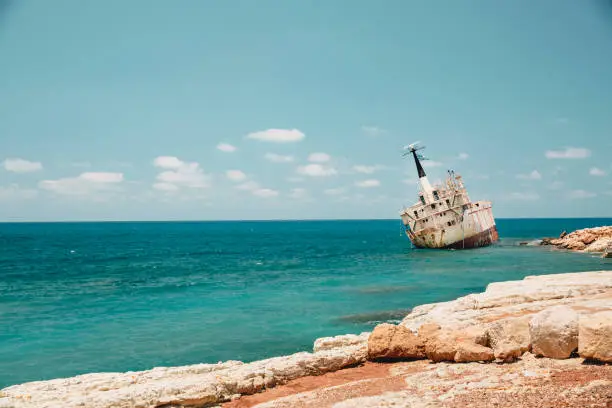 Abandoned cargo ship on the coast of Paphos, Cyprus, in the Mediterranean Sea.