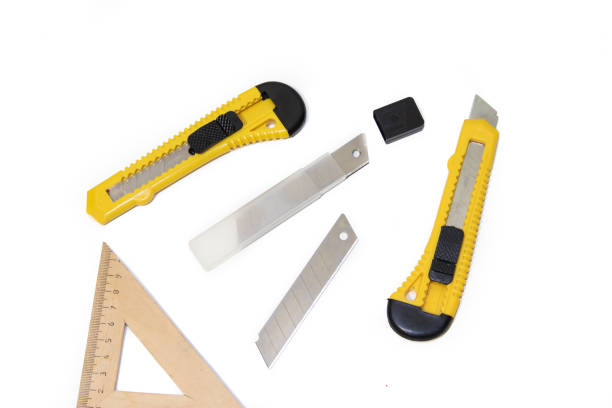 istock Construction knives on a white background Tools on a white background. Items for repair and collection of furniture. 1078554612