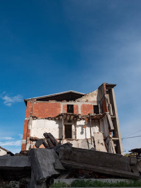 istock Old destroyed an abandoned multi-storey building in a military town 1078557882
