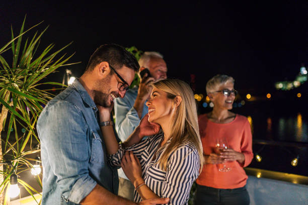 istock Lovely affectionate could and their parents on a rooftop 1078558368