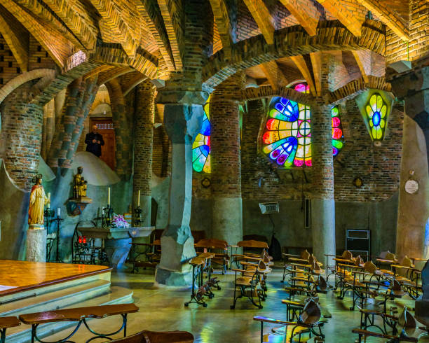 Guell Crypt Interior, Catalonia, Spain Interior view of guell crypt, a masterpiece gaudi architecture located at catalunya outside town crypts stock pictures, royalty-free photos & images