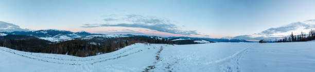 istock Evening winter mountain ridge view through car windshield 1078560586